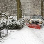 Truck Snow Plowing Driveway