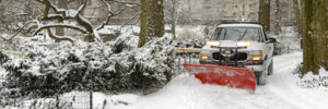 Truck Snow Plowing Driveway